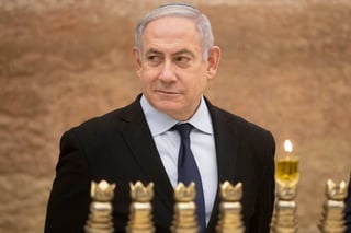 El primer ministro israelí, quien buscará reelegirse en las elecciones primarias de hoy, fue llevado a un refugio antibombas. (ARCHIVO)