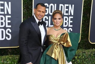Jennifer Lopez pasó un momento memorable en las fiestas posteriores a la entrega de los Globos de Oro este domingo, dejando claro que perder el galardón no le afectó en lo absoluto y sorprendiendo al describir a su pareja, el exbeisbolista Alex Rodríguez, como 'esposo' en una entrevista. (ESPECIAL)