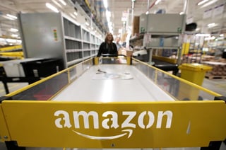 Los buenos resultados de la empresa fueron muy bien recibidos por Wall Street, donde las acciones de Amazon se apreciaron hasta doce por ciento. (ARCHIVO) 