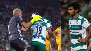 Nahuel Guzmán, le ofreció disculpas a Eduardo Aguirre, delantero de Santos, después de la patada que le dio durante el choque. (ESPECIAL/EL SIGLO DE TORREÓN)