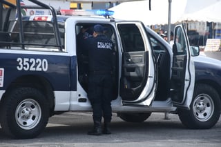 Patrulleros de la Dirección de Seguridad Pública Municipal, montaron un operativo de búsqueda de los agresores. (EL SIGLO DE TORREÓN)