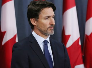 Trudeau dijo que las restricciones de viaje seguirán en vigor por varias semanas. (CORTESÍA) 