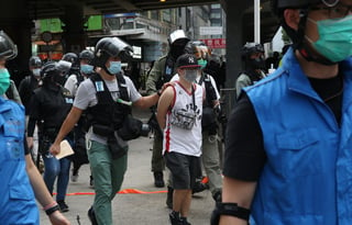 Activistas en Hong Kong se quejaron porque la ley socavaría las libertades civiles y podría emplearse para reprimir la actividad política. (EFE)