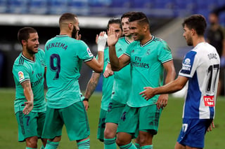 Este domingo Real Madrid venció como visitante 1-0 al Espanyol de Barcelona con lo que cuadro merengue dio un paso más hacia el gallardete de campeón de liga al conjuntarse este resultado con el empate 2-2 entre Barcelona y Celta de Vigo. (ARCHIVO)