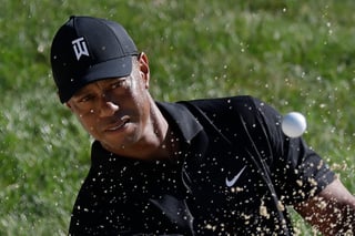 El estelar golfista Tiger Woods durante una práctica para el Memorial Tournament, que se jugará de hoy al domingo. (AP)