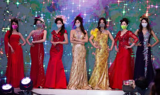 DESFILE. Modelos surcoreanas portaron sus cubrebocas al último grito de la moda. (CORTESÍA / EFE)