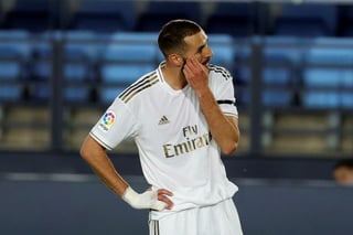 Karim Benzema, delantero del Real Madrid, fue el segundo mejor goleador de la temporada española con 21 tantos. (ARCHIVO)