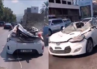 Este viernes un conductor libanés captó a otro conductor transitando por una avenida con un auto completamente dañado. (TWITTER) 
