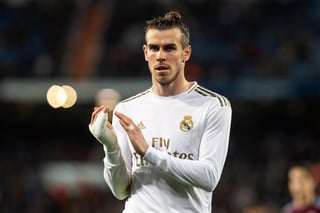 El internacional galés Gareth Bale trasladó al Real Madrid la decisión de su continuidad y aseguró que su deseo era haberse marchado 'el año pasado' pero que 'el club lo bloqueó'. (ARCHIVO)