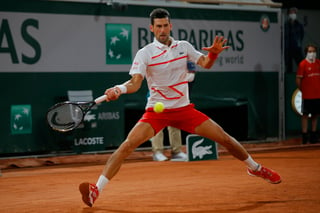 Novak Djokovic se impuso con gran facilidad 6-0, 6-2, 6-3 al Sueco Mikael Ymer en la primera ronda de Roland Garros; en la siguiente fase el serbio se enfrentará a Ricardas Berankis. (AP)