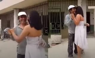 Portando un vestido blanco, la joven bailó con su padre a las afueras del edificio donde éste trabaja (CAPTURA) 
