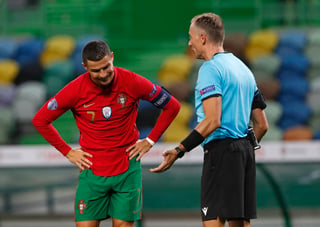 La federación portuguesa informó del positivo de Cristiano, y dijo que el delantero no presenta síntomas. (AP)