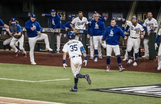 Los Dodgers de Los Ángeles aseguraron su regreso a la Serie Mundial; esto tras venir de atrás en la Serie de Campeonato de la Liga Nacional e imponerse por 4-3 sobre los Bravos de Atlanta. (EFE)