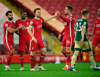 Sin la determinación ni la autoridad de antaño el Liverpool salió airoso de la visita a Anfield del Sheffield (2-1) gracias a una remontada propiciada por el brasileño Roberto Firmino y el portugués Diogo Jota. (ARCHIVO)