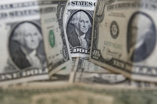 El dólar se ubicó por debajo de los 21 pesos a la compra en una jornada de alta volatilidad. (ARCHIVO) 