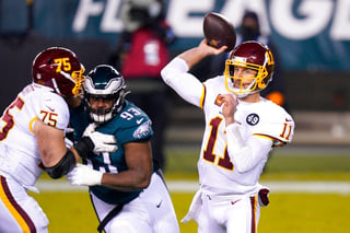 Alex Smith lanzó dos pases de touchdown y Washington venció el domingo 20-14 a los Eagles de Filadelfia para coronarse en la División Este de la Conferencia Nacional, pese a tener una foja negativa. (ESPECIAL) 