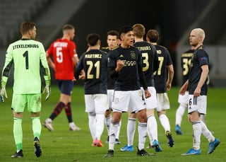 En tres minutos el Ajax remontó al Lille (1-2) para encarrilar la clasificación de los octavos de final de la Liga Europa que se definirá la próxima semana en Amsterdam. (EFE)