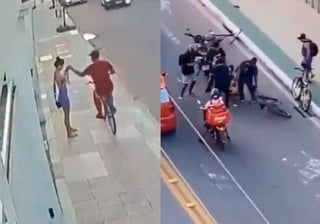 En Vila Velha, Brasil un hombre en bicicleta robó el celular de una joven que esperaba en la acera de una calle mientras ella estaba viendo la pantalla.  (Especial) 