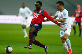 Jonathan David anotó dos veces en los últimos compases para que Lille venciera 2-0 a Marsella el miércoles y se mantuviera como líder de la liga francesa. (AP) 
 