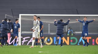 Porto consumó la gran sorpresa, y pese a jugar muchos minutos con un hombre menos, eliminó a la Juventus en octavos de final. (AP)