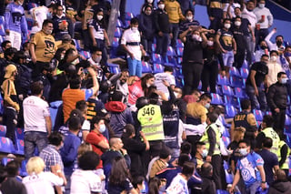 Gran indignación ha causado la agresión de la que fue víctima una mujer por parte de un aficionado de los Pumas, en el juego de ayer viernes entre el Puebla y el equipo universitario. (JAM MEDIA)