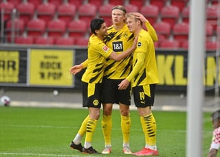 El Borussia Dortmund ganó en Maguncia (1-3) y aseguró su estancia entre los cuatro primeros de la Bundesliga, a falta de una jornada para el cierre de la temporada.