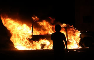 Reportan la detención de 10 agentes y el incendio de dos patrullas de la Guardia Nacional. (EFE)