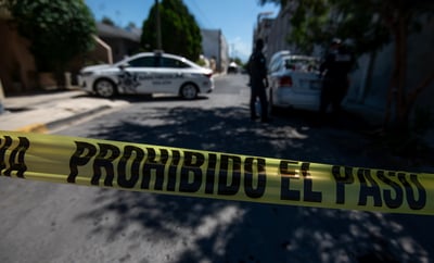 Cinta amarilla para prohibir el paso a una escena del crimen en Nuevo León. (ARCHIVO)