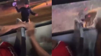 VIDEO: Policía lanza piedra a camión con aficionados de Chivas tras trifulca; hay 97 detenidos