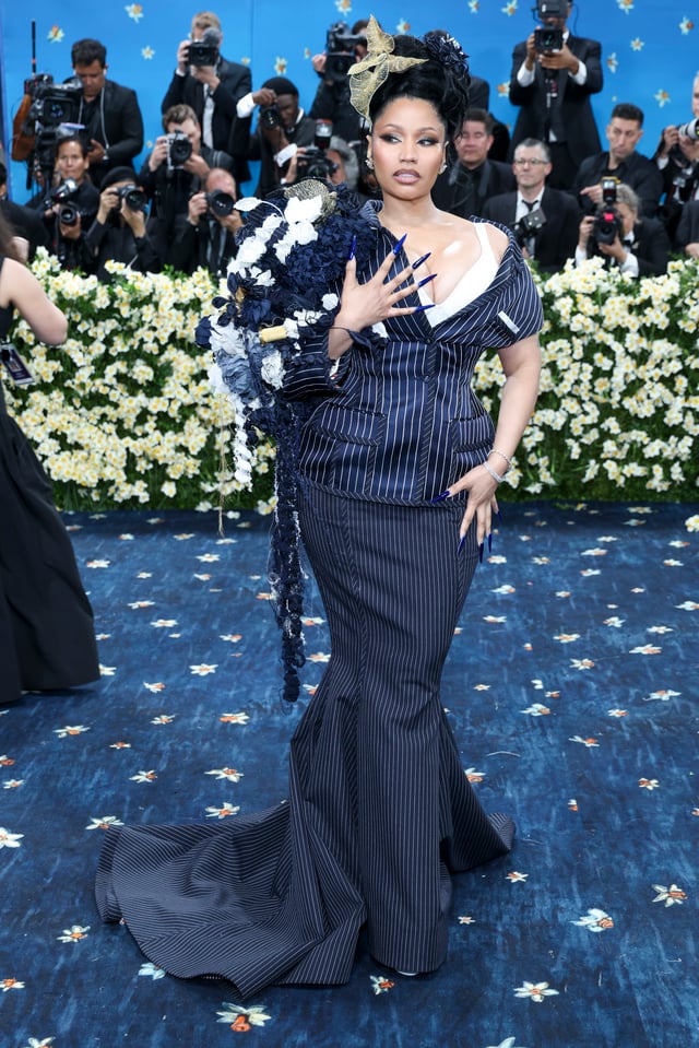 NEW YORK (United States), 06/05/2025.- Trinidadian rapper Nicki Minaj poses on the red carpet for the 2025 Met Gala, the annual benefit for the Metropolitan Museum of Art's Costume Institute, in New York, New York, USA, 05 May 2025. The event coincides with the Met Costume Institute's spring 2025 exhibition ‘Superfine: Tailoring Black Style’ which will be on view from 10 May 2025 through 26 October 2025.  (Nueva York) EFE/EPA/JUSTIN LANE