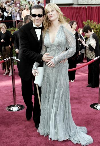 Antonio Banderas son su esposa Melanie Griffith.