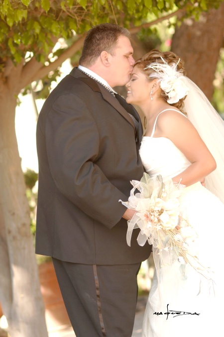 Lic. Juan Antonio Mejía Mora y Lic. Éricka Elizabeth Sánchez Escamilla contrajeron matrimonio en la parroquia de La Sagrada Familia el sábado 20 de septiembre de 2008. 

Estudio Carlos Maqueda