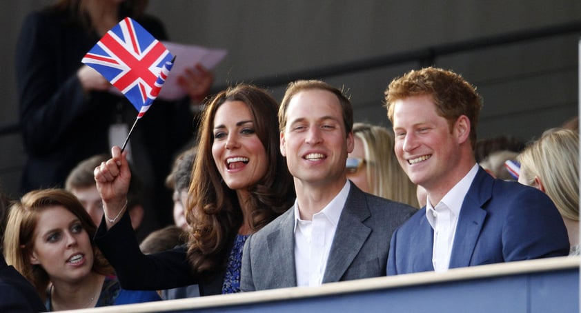 La famosa pareja real junto al prícipe Harry se divirtieron en el concierto.