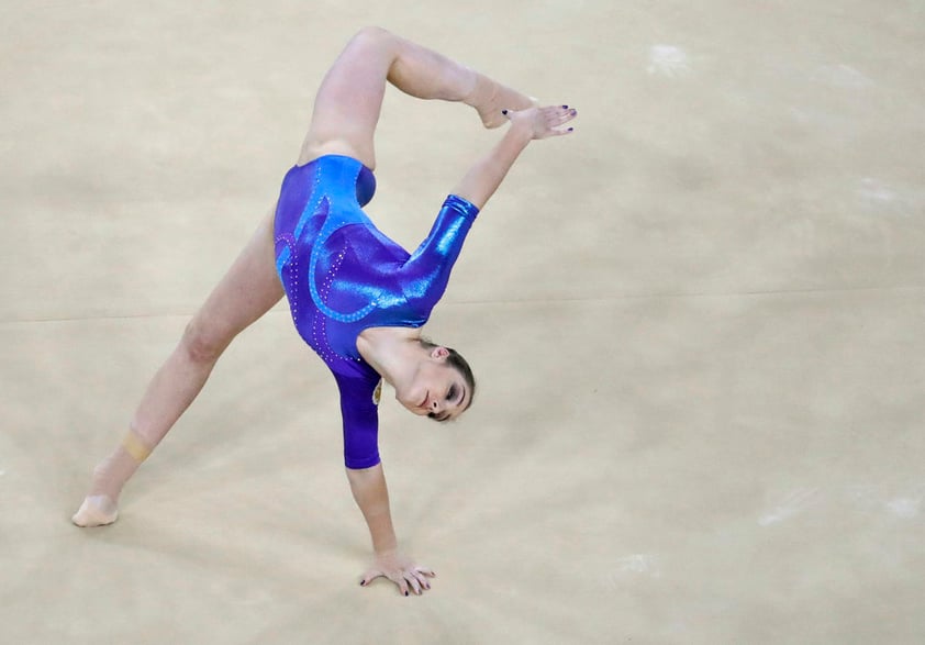 Aliya Mustafina limpió el mal nombre que lleva su país al colgarle otro oro.