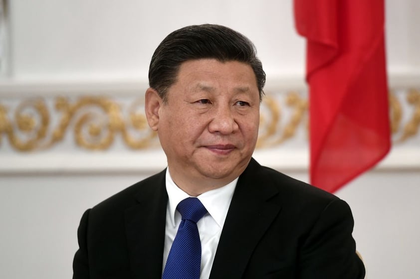 El presidente chino Xi Jinping los acompaña.