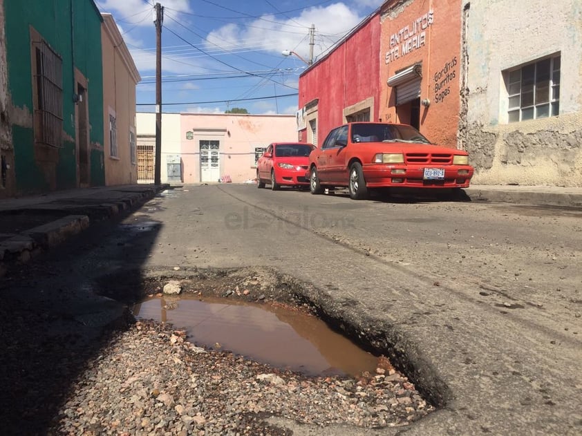 Calle Santa María y Carlos León de la Peña.