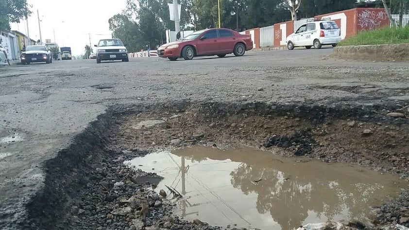 Mártires de Sonora esquina con Hacienda Coyotes, casi enfrente del CBTIS 110.