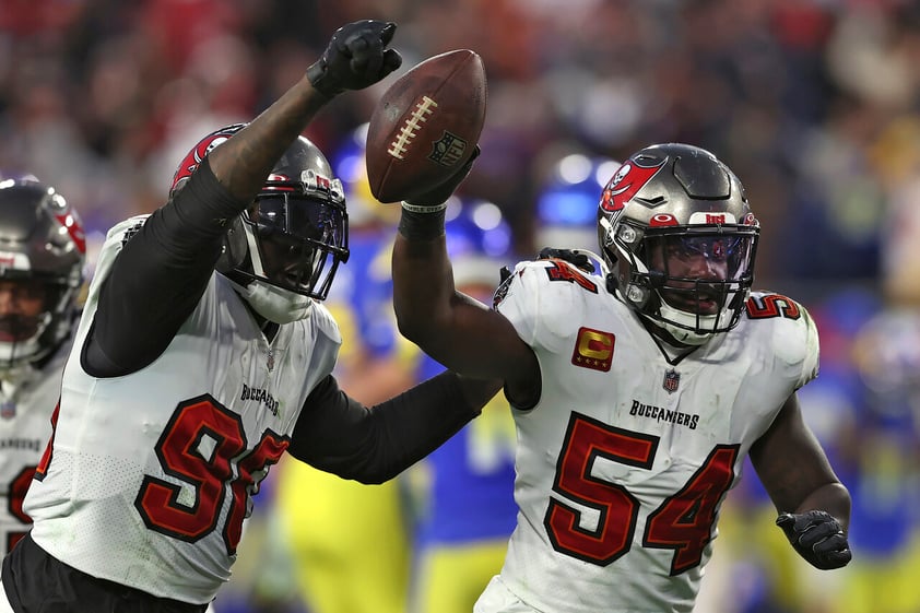 Tampa Bay Buccaneers inside linebacker Lavonte David (54) celebrates after recovering a fumble by the Los Angeles Rams during the second half of an NFL divisional round playoff football game Sunday, Jan. 23, 2022, in Tampa, Fla. (AP Photo/Mark LoMoglio)