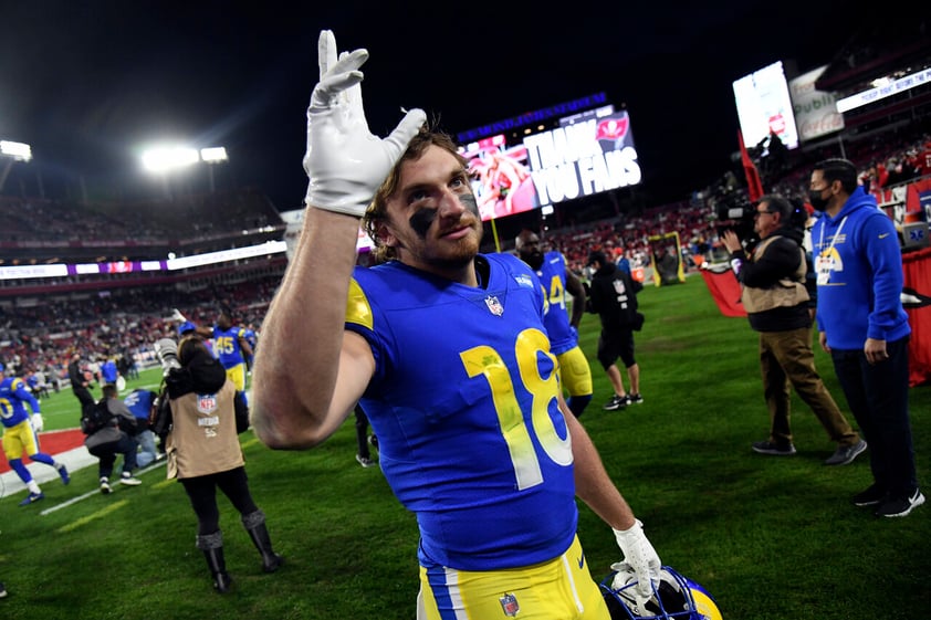 Los Angeles Rams wide receiver Ben Skowronek (18) celebrates as he leaves the field after the team defeated the Tampa Bay Buccaneers during an NFL divisional round playoff football game Sunday, Jan. 23, 2022, in Tampa, Fla. (AP Photo/Jason Behnken)