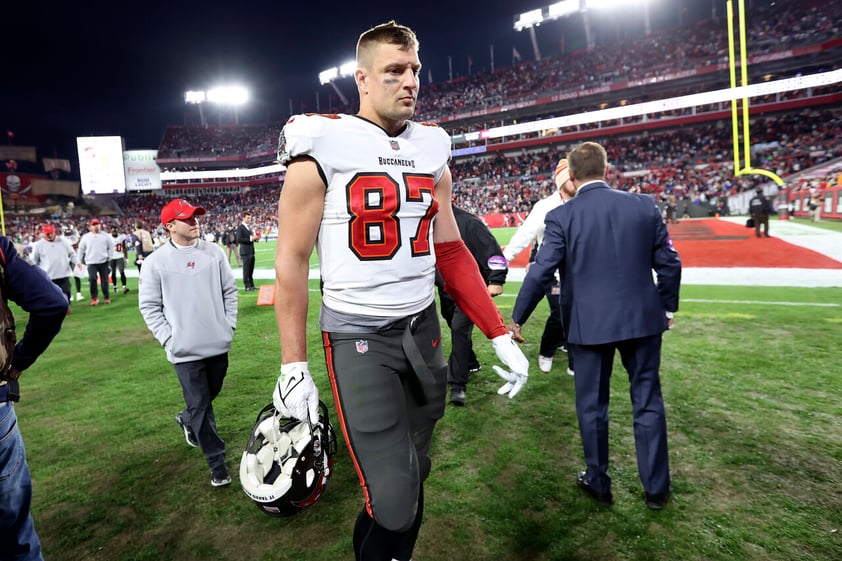 Tampa Bay Buccaneers tight end Rob Gronkowski (87) leaves the field after the team lost to the Los Angeles Rams during an NFL divisional round playoff football game Sunday, Jan. 23, 2022, in Tampa, Fla. (AP Photo/Mark LoMoglio)