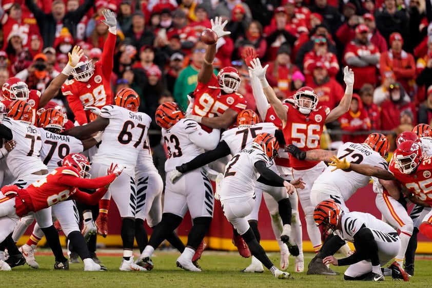 Cincinnati Bengals kicker Evan McPherson (2) kicks a 31-yard field goal during overtime in the AFC championship NFL football game against the Kansas City Chiefs, Sunday, Jan. 30, 2022, in Kansas City, Mo. The Bengals won 27-24. (AP Photo/Charlie Riedel)