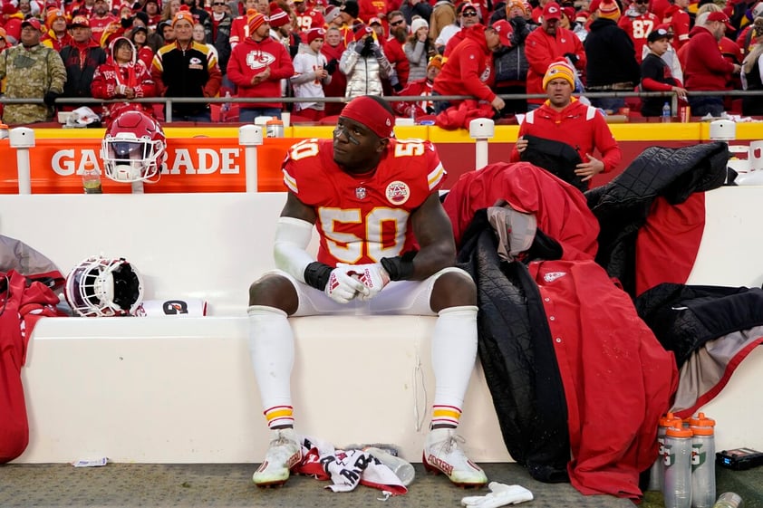 Kansas City Chiefs middle linebacker Willie Gay Jr. (50) sits on the bench at the end of the AFC championship NFL football game against the Cincinnati Bengals, Sunday, Jan. 30, 2022, in Kansas City, Mo. The Bengals won 27-24 in overtime. (AP Photo/Ed Zurga)