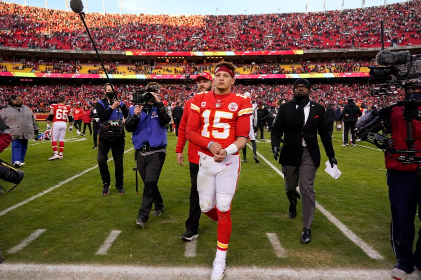 Kansas City Chiefs quarterback Patrick Mahomes (15) walks off the field at the end of the AFC championship NFL football game against the Cincinnati Bengals, Sunday, Jan. 30, 2022, in Kansas City, Mo. The Bengals won 27-24 overtime.  (AP Photo/Ed Zurga)