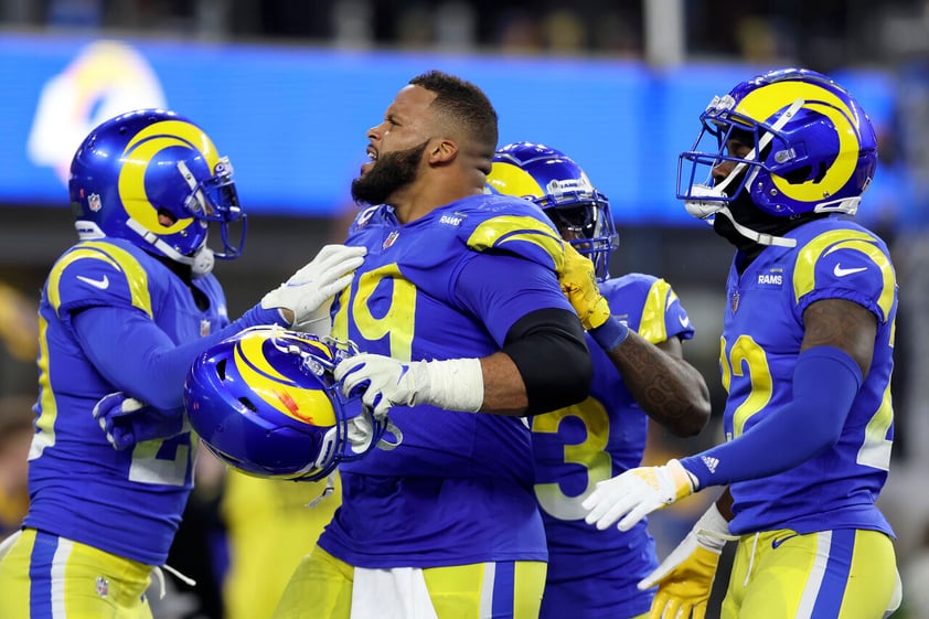 Los Angeles Rams defensive end Aaron Donald, middle, celebrates with teammates during the second half of the NFC Championship NFL football game against the San Francisco 49ers Sunday, Jan. 30, 2022, in Inglewood, Calif. (AP Photo/Jed Jacobsohn)