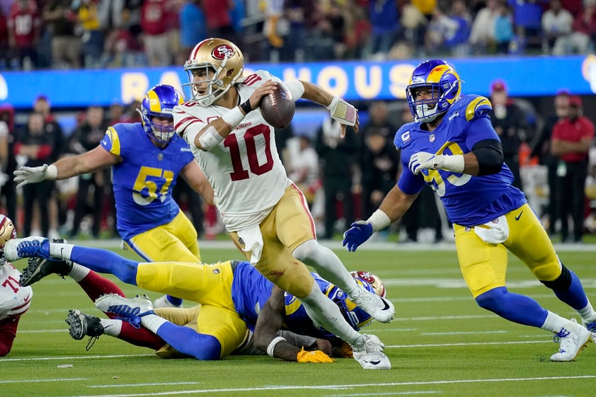 San Francisco 49ers' Jimmy Garoppolo scrambles during the second half of the NFC Championship NFL football game against the Los Angeles Rams Sunday, Jan. 30, 2022, in Inglewood, Calif. The Rams won 20-17 to advance to the Super Bowl. (AP Photo/Mark J. Terrill)