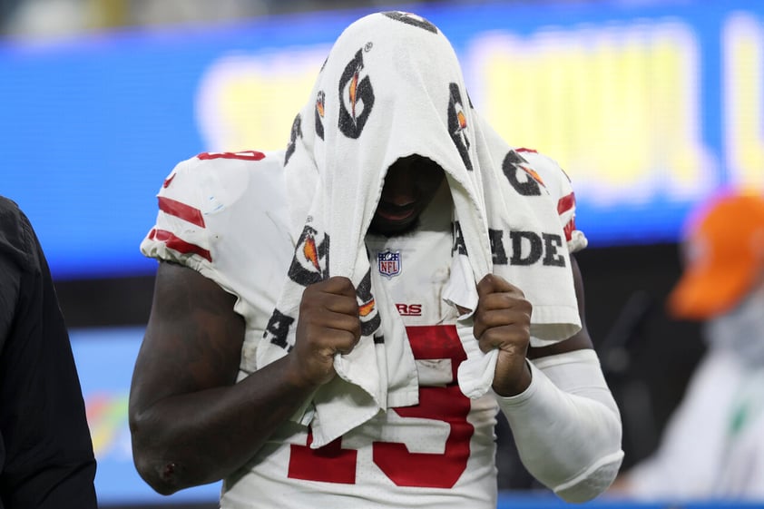 San Francisco 49ers' Deebo Samuel walks off the field after the NFC Championship NFL football game against the Los Angeles Rams Sunday, Jan. 30, 2022, in Inglewood, Calif. The Rams won 20-17 to advance to the Super Bowl. (AP Photo/Jed Jacobsohn)