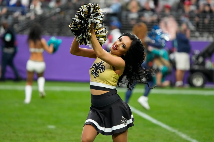 A New Orleans Saints cheerleader performs during the second half of the Pro Bowl NFL football game between the AFC and the NFC, Sunday, Feb. 6, 2022, in Las Vegas. The AFC won 41-35. (AP Photo/Rick Scuteri)