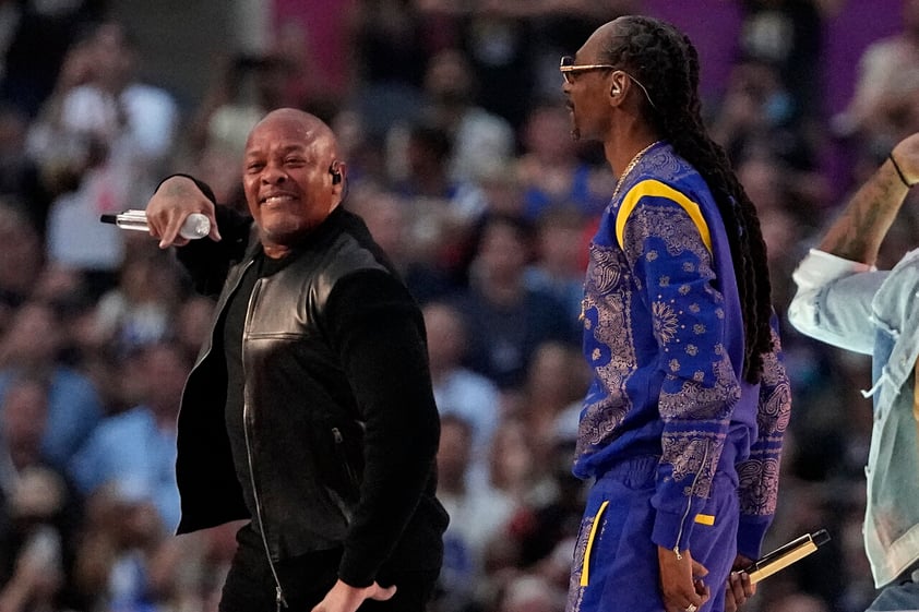 Dr. Dre, left, and Snoop Dogg perform during halftime of the NFL Super Bowl 56 football game between the Los Angeles Rams and the Cincinnati Bengals, Sunday, Feb. 13, 2022, in Inglewood, Calif. (AP Photo/Tony Gutierrez)