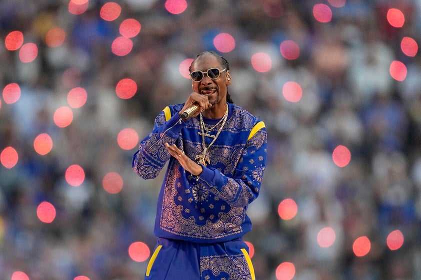 Snoop Dogg performs during halftime of the NFL Super Bowl 56 football game between the Los Angeles Rams and the Cincinnati Bengals Sunday, Feb. 13, 2022, in Inglewood, Calif. (AP Photo/Marcio Jose Sanchez)