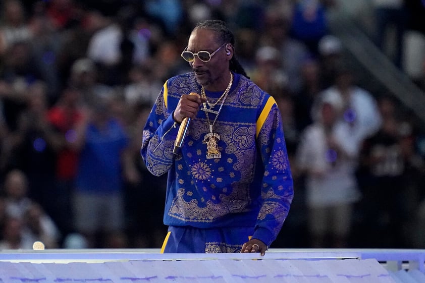 Snoop Dogg performs during halftime of the NFL Super Bowl 56 football game between the Cincinnati Bengals and the Los Angeles Rams Sunday, Feb. 13, 2022, in Inglewood, Calif. (AP Photo/Julio Cortez)